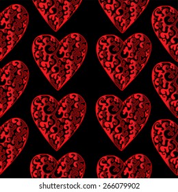 Seamless vector pattern with red ornamental hearts on a black background