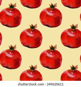 Seamless vector pattern with red pomegranates on a yellow background. Hand drawn fruits by watercolor