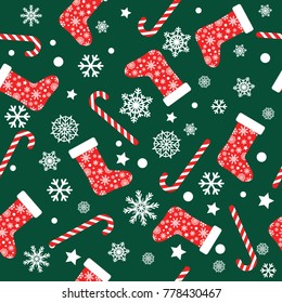 Seamless vector pattern with red and white christmas stocking socks, candy canes and snowflakes