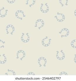 Seamless vector pattern repeat of scattered horseshoes.