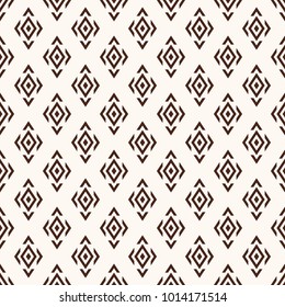 Seamless vector pattern from the repeating brown rhombuses in Asian style on a beige background. Vector color background.