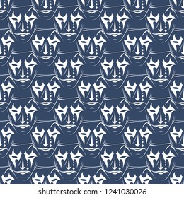Seamless vector pattern from repeating gold theatrical masks on a blue background. Curtain. Comedy. Tragedy. Cheerful and sad actor. Kind and evil. Endless texture for textile design. Vintage style. 