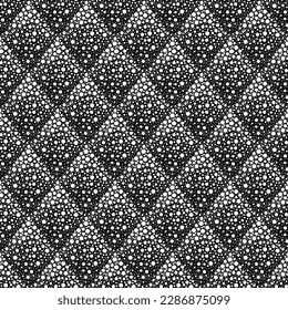 seamless vector pattern with rhombuses filled with dots. monochrome abstract background pattern