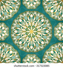 Seamless vector pattern with round elements. Ornament of emerald mandala on turquoise background. Template for any surface.