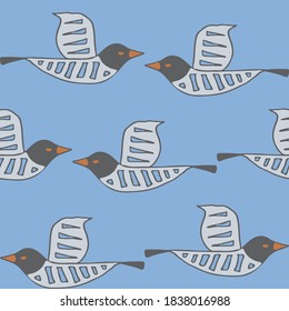 Seamless vector pattern with seagull on blue background. Simple artistic bird wallpaper design. Wildlife fashion textile.