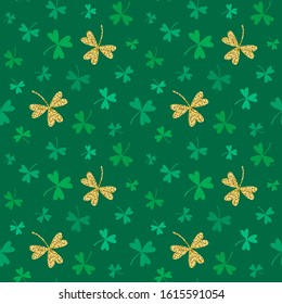 Seamless vector pattern with shamrocks and golden clover. St. Patrick's Day background.