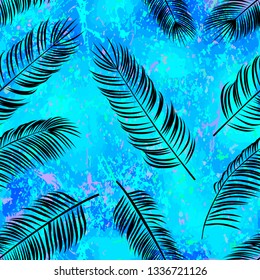 Seamless  vector pattern with  silhouette palm leaves on color background.