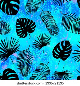 Seamless  vector pattern with  silhouette palm leaves on color background.