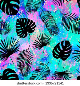 Seamless  vector pattern with  silhouette palm leaves on color background.