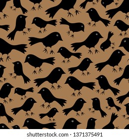 Seamless vector pattern with silhouettes of blackbirds on brown background. Simple wallpaper design with birds.