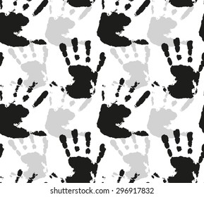 Seamless vector pattern with silhouettes of watercolor prints of children's hands for your creativity