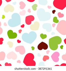 Seamless vector pattern. Simple Abstract design. Little cute hearts shapes in bright festive children's colors. Blue, pink, yellow, purple, green