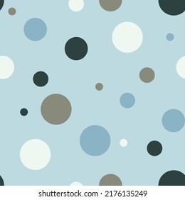 Seamless vector pattern with simple circles on blue background. Modern geometrical nursery wallpaper design. Decorative baby shower fashion textile.