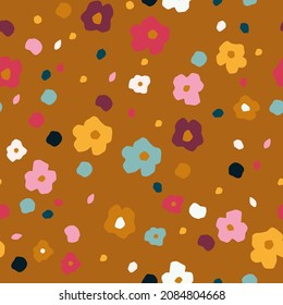 Seamless vector pattern, simplified floral shapes in bright colours with polka dots on a yellow background