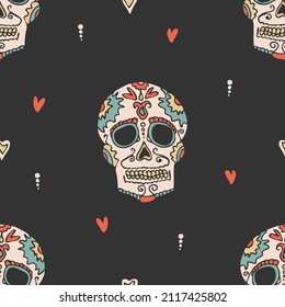 Seamless vector pattern with skull head on grey background. Simple Halloween wallpaper design. decorative hand drawn mexico style fashion textile.