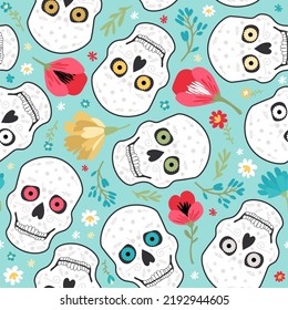 Seamless vector pattern of skulls, bones and flowers. Day of the Dead. For fabric, wrapping paper, wallpaper.