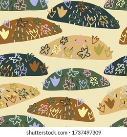 Seamless vector pattern of small abstract hills with flowers in different warm colors. The design is perfect for backgrounds, decorations, textile, surface design and outside decorations.