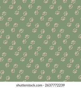 Seamless vector pattern of small, charming light brown paw prints in neutral colors on a solid green background, giving it a modern look. Perfect for pet-themed designs and children's decor.