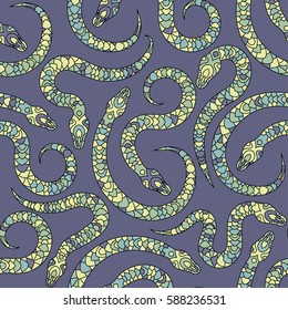 Seamless vector pattern with snakes in tribal style.