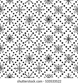 Seamless vector pattern with snowflakes. Black, white symmetrical seasonal winter background with cute hand drawn decorative elements. Graphic illustration. Series of winter seamless vector patterns..