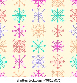 Seamless vector pattern with snowflakes. Colorful winter background with decorative hand drawn snow flakes. Graphic illustration. Series of winter seamless vector patterns.
