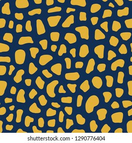 Seamless vector pattern stylized animal skin texture. Abstract background with mosaic shapes. Yellow gold shapes on blue backdrop. Contemporary design for fabric, digital paper, packaging, covers