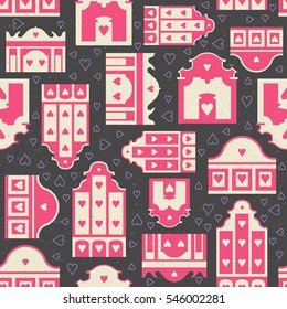 Seamless vector pattern of stylized vintage Dutch pink and white houses for Valentine's Day 14 February. Hearts on black background.