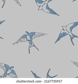 Seamless vector pattern with swallow bird doodle on grey background. Simple flock of bird wallpaper design. Decorative blue bird fashion textile.
