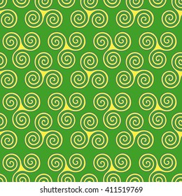 Seamless vector pattern with swirling triple spiral or Triskele, a complex ancient Celtic symbol, shapes in yellow and blue on the green background
