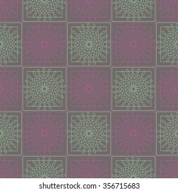 Seamless vector pattern. Symmetrical geometric background with colorful squares and circles on the violet backdrop. Decorative ornament.