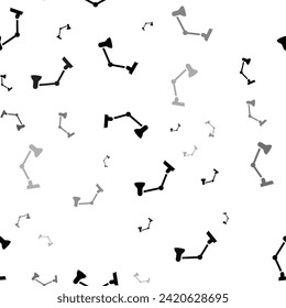 Seamless vector pattern with table lamp symbols, creating a creative monochrome background with rotated elements. Vector illustration on white background