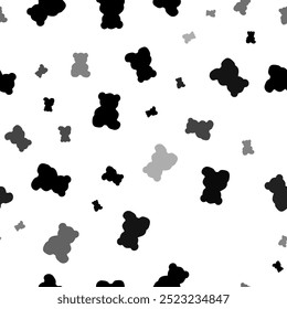 Seamless vector pattern with teddy bear symbols, creating a creative monochrome background with rotated elements. Vector illustration on white background