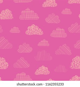 Seamless vector pattern textured clouds. Beige silhouettes of cute doodle clouds on a pink background. Great for kids, baby girl, fabric, paper, web banners, wallpaper, cards, invites, baby shower