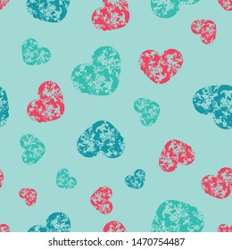 A seamless vector pattern with textured heart shapes. Surface print design.