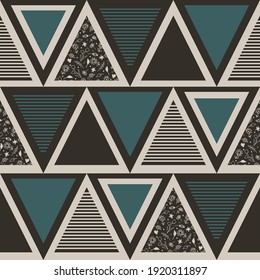 Seamless vector pattern with textured triangles on grey background. Geometrical mosaic wallpaper design. Decorative fashion textile for creative home.