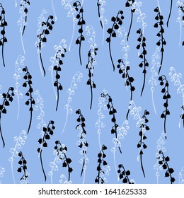 Seamless vector pattern with thin branches of flowers. Lilies of the valley on a blue background.