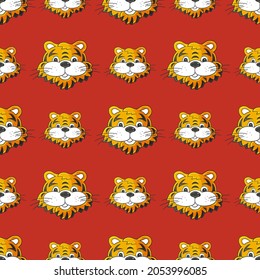 Seamless vector pattern with tigers faces. Pattern in hand draw style. New Year's holidays 2022. Year of the tiger