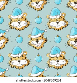 Seamless vector pattern with tigers heads in Christmas hats. 2022. Year of the tiger. Can be used for fabric, packaging and etc