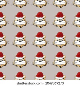 Seamless vector pattern with tigers heads in Christmas hats. 2022. Year of the tiger. Can be used for fabric and etc