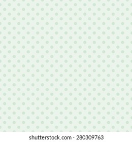 Seamless vector pattern with tile green polka dots on light mint background