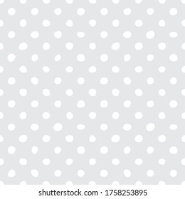 Seamless vector pattern with tile white polka dots on grey background