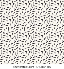 Seamless vector pattern. Tiny hand drawn tossed confetti shapes. Repeating geo  background. Monochrome surface design textile swatch, modern black white wallpaper, wedding sprinkles all over print. 
