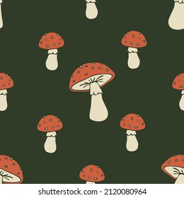 Seamless vector pattern with toadstools on green background. Simple hand drawn mushroom wallpaper design. Decorative forest fashion textile.