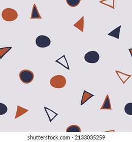 Seamless vector  pattern with triangles and circles on grey background. Simple modern wallpaper texture. Decorative fun fashion textile.
