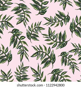 Seamless vector pattern of tropical green branches with leaves on a sophisticated pink background. Gives a Miami or Havana vibe. Great for textiles, stationery, home decor, journal covers & wallpaper.