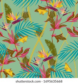 Seamless vector pattern with tropical jungle plants. Strelitzia flowers, palm leaves, gold chains and gold butterflies on a light green blue, aquamarine color background. Modern trendy design