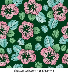 Seamless vector pattern tropical monstera leaves and hibiscus flowers on dark green background