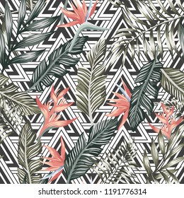 Seamless vector pattern of tropical palm leaves and flowers. Fashion nature floral beach wallpaper on a geometric triangle background