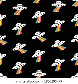 Seamless vector pattern with ufo, spaceship. Unknown Flying Object. Black background