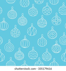 Seamless vector pattern of various Christmas balls on a light blue background painted by hand.